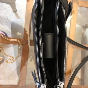 Black purse with strap